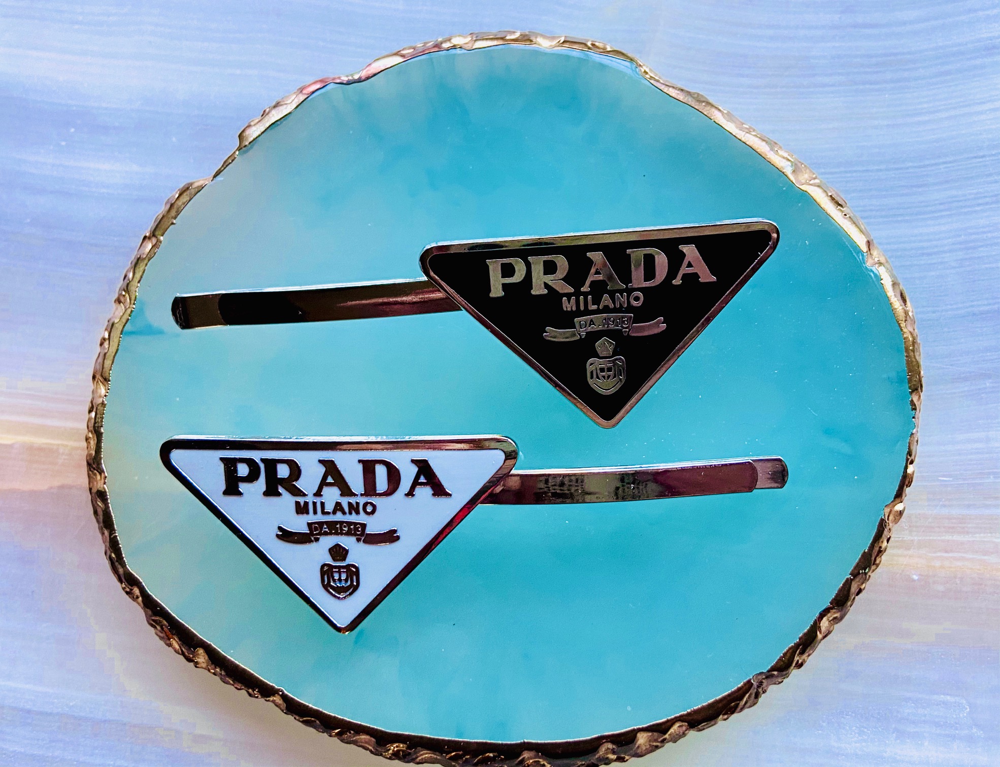 Prada triangle-logo hair clip, White